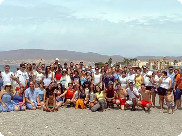 Foto de grupo de la iglesia en la playa